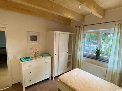 Ein Bett oder Betten in einem Zimmer der Unterkunft Ferienwohnung Leimitz