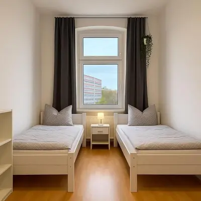Ein Bett oder Betten in einem Zimmer der Unterkunft YourFavoriteBed Designwohnung Nähe Zentrum und Klinikum