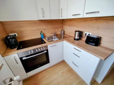 Küche/Küchenzeile in der Unterkunft YourFavoriteBed Designwohnung Nähe Zentrum und Klinikum