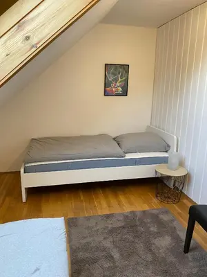 Ein Bett oder Betten in einem Zimmer der Unterkunft Apartmenthaus Selbitz