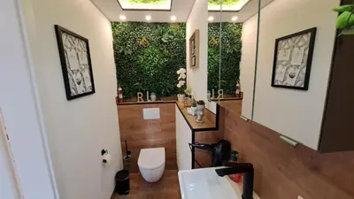 Ein Badezimmer in der Unterkunft Appartment-Ferienwohnung mit Küche, Bad, WLAN, Klimaanlage, Modern eingerichtet