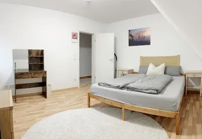 Ein Bett oder Betten in einem Zimmer der Unterkunft American Ease Apartments - Hahnbach, Vilseck, Weiden