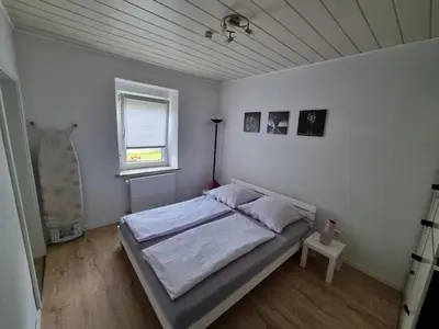 Ein Bett oder Betten in einem Zimmer der Unterkunft (Ferien-)Wohnung im schönen Fichtelgebirge