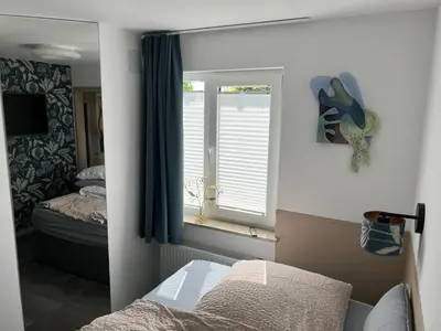Ein Bett oder Betten in einem Zimmer der Unterkunft Apartment Siegfried