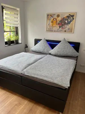 Ein Bett oder Betten in einem Zimmer der Unterkunft City Park Loft