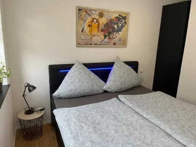 Ein Bett oder Betten in einem Zimmer der Unterkunft City Park Loft