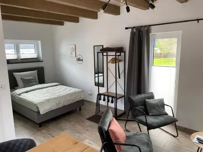 Ein Bett oder Betten in einem Zimmer der Unterkunft Fichtelcube de