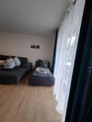 Ein Sitzbereich in der Unterkunft Ferienwohnung mit Balkon