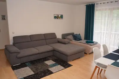 Ein Sitzbereich in der Unterkunft Ferienwohnung mit Balkon