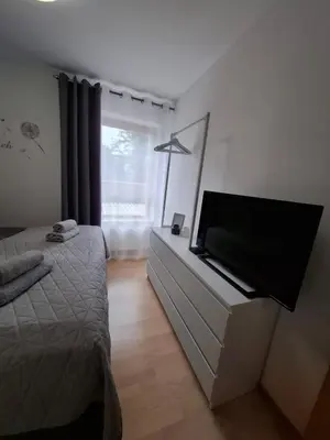 Ein Bett oder Betten in einem Zimmer der Unterkunft Ferienwohnung mit Balkon