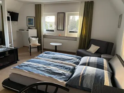 Ein Bett oder Betten in einem Zimmer der Unterkunft Villa Sonnenschein im Zentrum Bad Stebens nahe der Therme