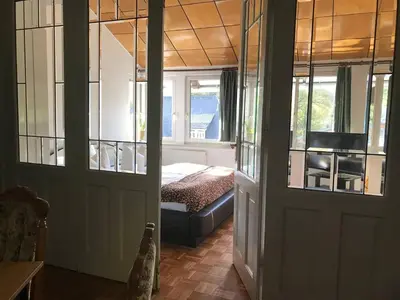 Ein Bett oder Betten in einem Zimmer der Unterkunft Ferienwohnung in Villa
