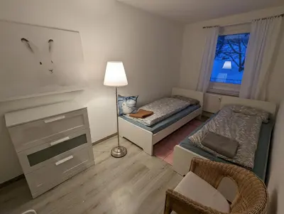 Ein Bett oder Betten in einem Zimmer der Unterkunft Ferienwohnungen Zauberberg, Schneehase & Glitzerhirsch
