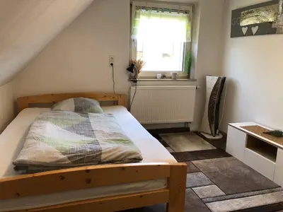 Ein Bett oder Betten in einem Zimmer der Unterkunft Fine Ferienwohnung Bayreuth