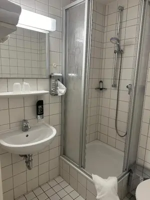 Ein Badezimmer in der Unterkunft Hotel Haus am Ahorn