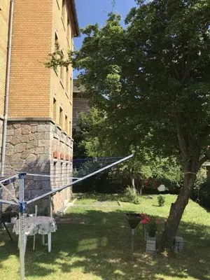 Ein Garten an der Unterkunft Gemütliche Wohnung mit Küche und Netflix