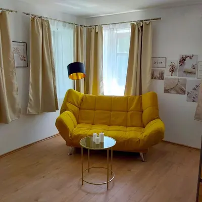 Ein Sitzbereich in der Unterkunft Gemütliche Wohnung mit Küche und Netflix