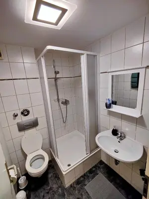 Ein Badezimmer in der Unterkunft Gemütliche, charmante Ferienwohnung Nähe Zentrum
