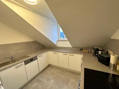 Küche/Küchenzeile in der Unterkunft Gemütliche, charmante Ferienwohnung Nähe Zentrum