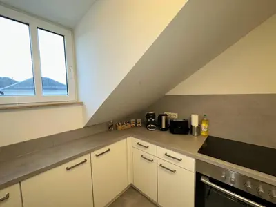 Küche/Küchenzeile in der Unterkunft Gemütliche, charmante Ferienwohnung Nähe Zentrum