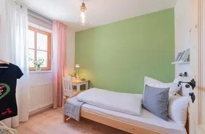 Ein Bett oder Betten in einem Zimmer der Unterkunft Roomerie