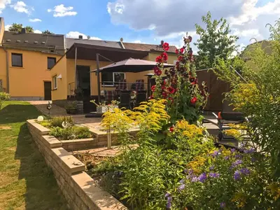 Ein Garten an der Unterkunft APARTMENT SONNE Reusa