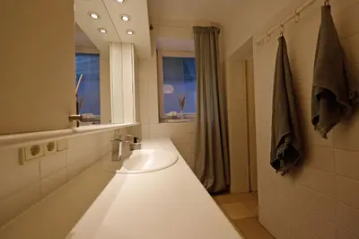 Ein Badezimmer in der Unterkunft Paterre Wohnung in der Rosa Villa