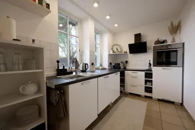 Küche/Küchenzeile in der Unterkunft Paterre Wohnung in der Rosa Villa