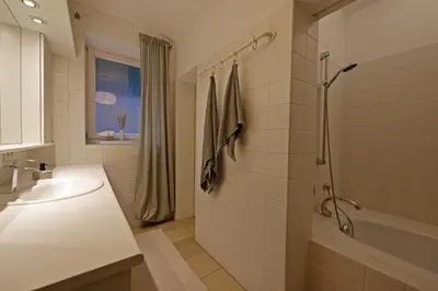 Ein Badezimmer in der Unterkunft Paterre Wohnung in der Rosa Villa
