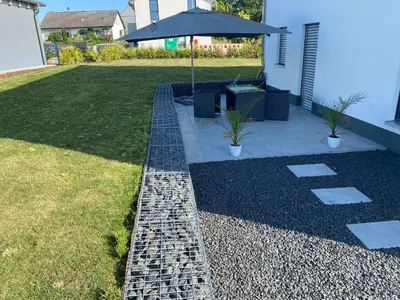 Ein Garten an der Unterkunft Beautiful Apartment with a huge private terrace