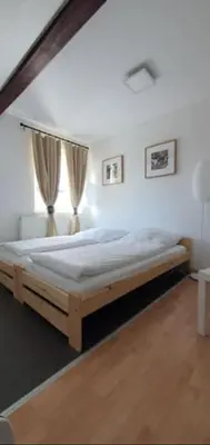 Ein Bett oder Betten in einem Zimmer der Unterkunft Geräumige Wohnungen Zentrumsnah Schwandorf