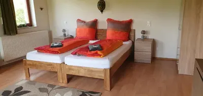 Ein Bett oder Betten in einem Zimmer der Unterkunft Gasthaus Zum Schneider