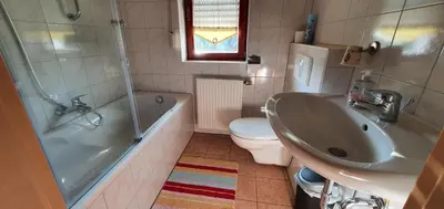 Ein Badezimmer in der Unterkunft Gasthaus Zum Schneider