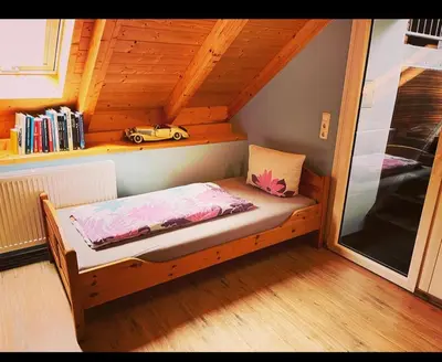 Ein Bett oder Betten in einem Zimmer der Unterkunft S7 Bayreuth Zentrum Klimaanlage Dachterrasse - Beste Lage