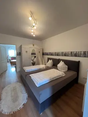 Ein Bett oder Betten in einem Zimmer der Unterkunft Die grüne Mitte