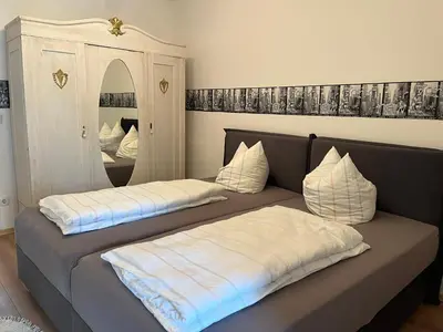 Ein Bett oder Betten in einem Zimmer der Unterkunft Die grüne Mitte