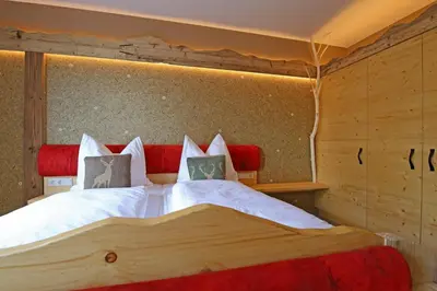 Ein Bett oder Betten in einem Zimmer der Unterkunft Naturpension Max-Hütte