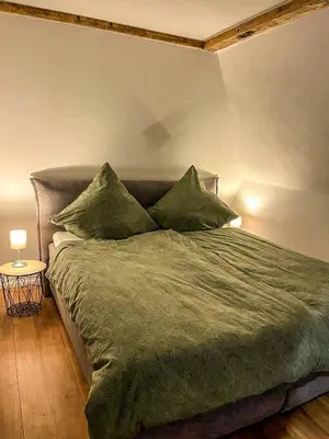 Ein Bett oder Betten in einem Zimmer der Unterkunft Super Lodge Kulmbach