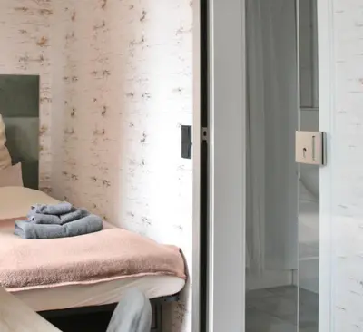 Ein Bett oder Betten in einem Zimmer der Unterkunft The Manhattan A Boutique Hotel By American Ease