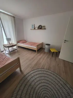 Ein Bett oder Betten in einem Zimmer der Unterkunft Beautiful Cozy apartments close to lakes and nature parks