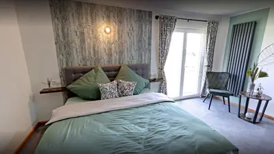 Ein Bett oder Betten in einem Zimmer der Unterkunft Brauhaisla