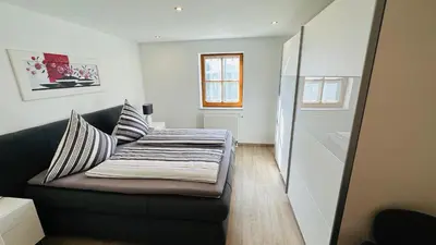 Ein Bett oder Betten in einem Zimmer der Unterkunft FeWo - Im SCHWARZACHTAL