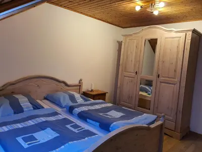 Ein Bett oder Betten in einem Zimmer der Unterkunft Kleberhof - Urlaub auf dem Bauernhof