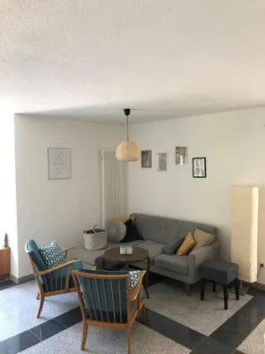 Ein Sitzbereich in der Unterkunft Ferienwohnung Villa Hygge