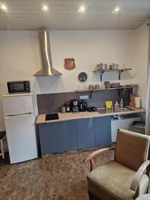 Küche/Küchenzeile in der Unterkunft Ferienwohnung Wunderlich gelb