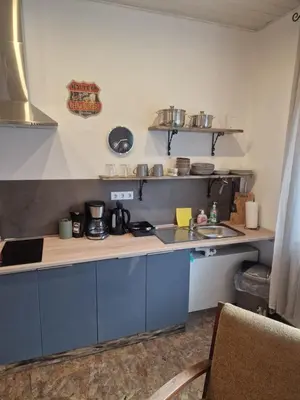 Küche/Küchenzeile in der Unterkunft Ferienwohnung Wunderlich gelb