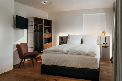 Ein Bett oder Betten in einem Zimmer der Unterkunft Bootshaus Amberg