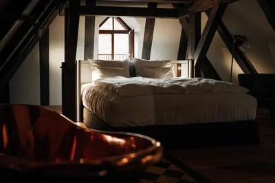 Ein Bett oder Betten in einem Zimmer der Unterkunft Bootshaus Amberg