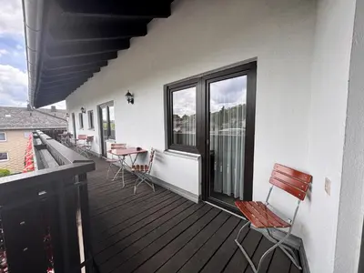 Ein Balkon oder eine Terrasse in der Unterkunft Pension Hubertus