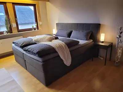 Ein Bett oder Betten in einem Zimmer der Unterkunft Ferienwohnung Seeglück im Oberpfälzer Seenland